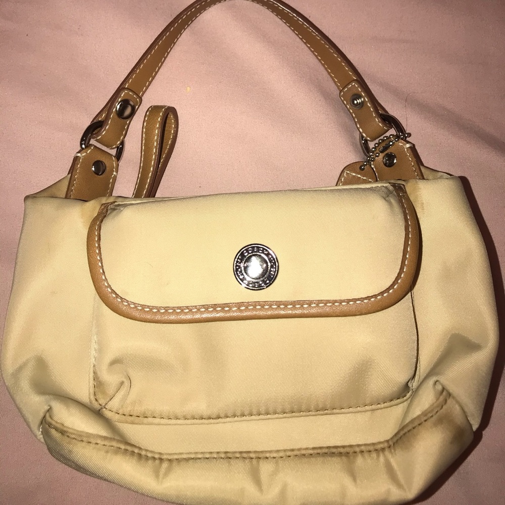 nude coach mini purse